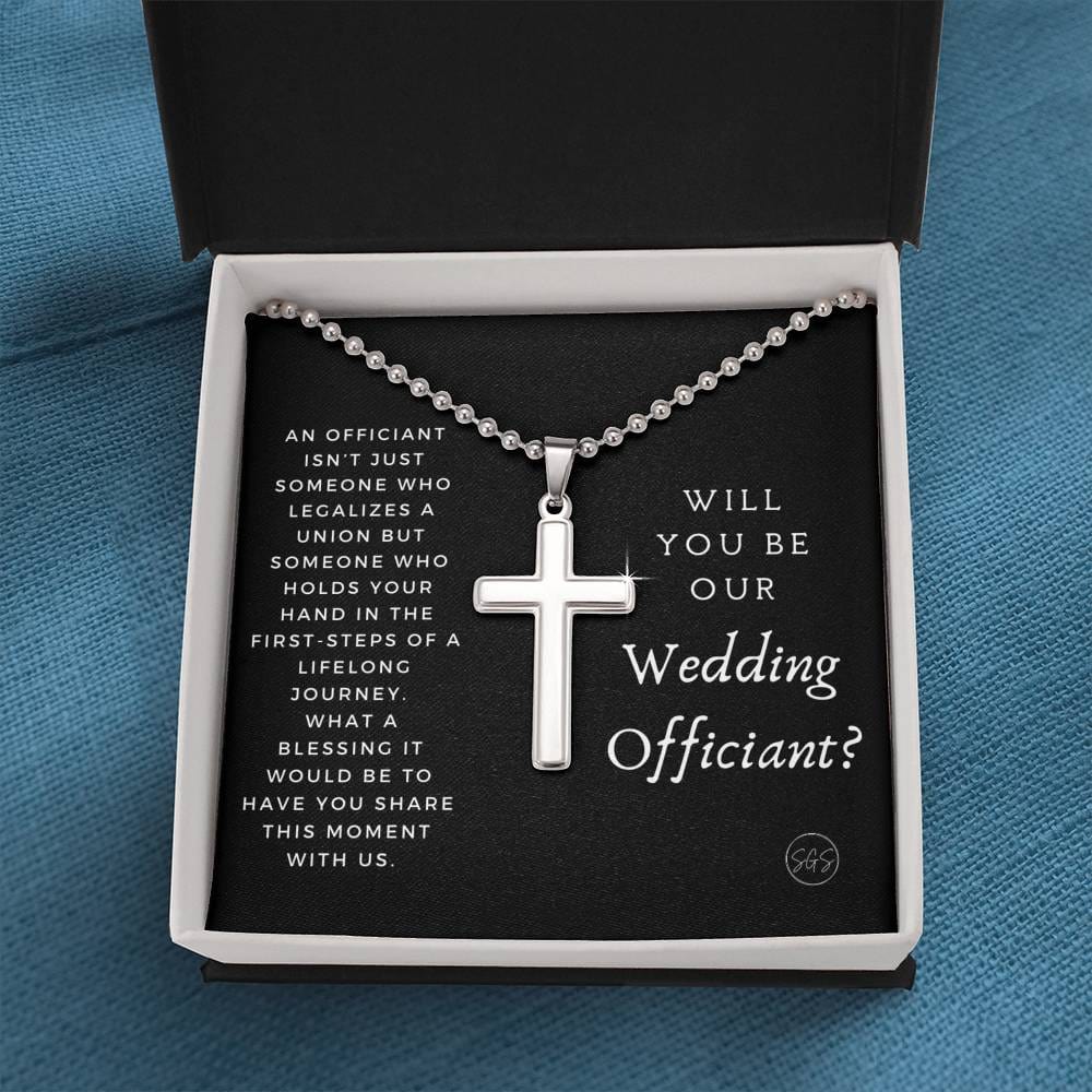 officiant prop holds hand black cross
