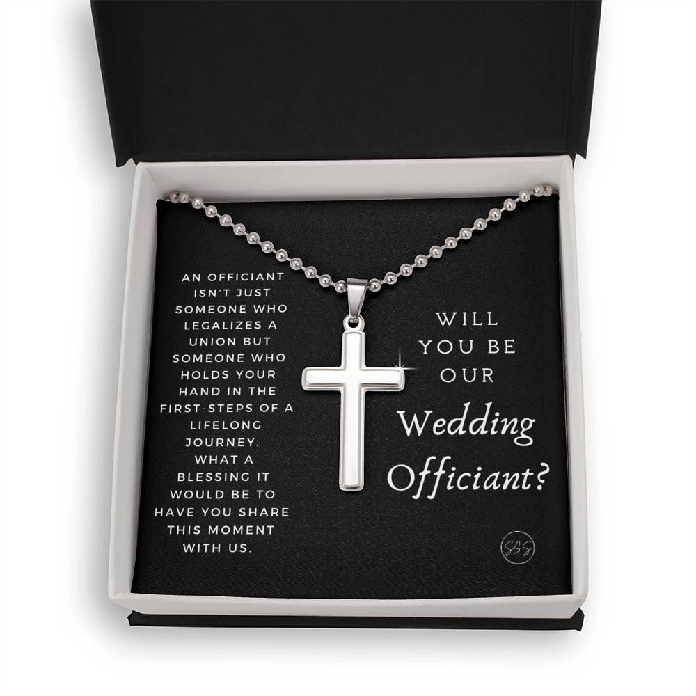 officiant prop holds hand black cross